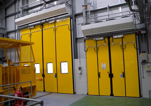 Train and delivery vehicle access swift bi-folding doors