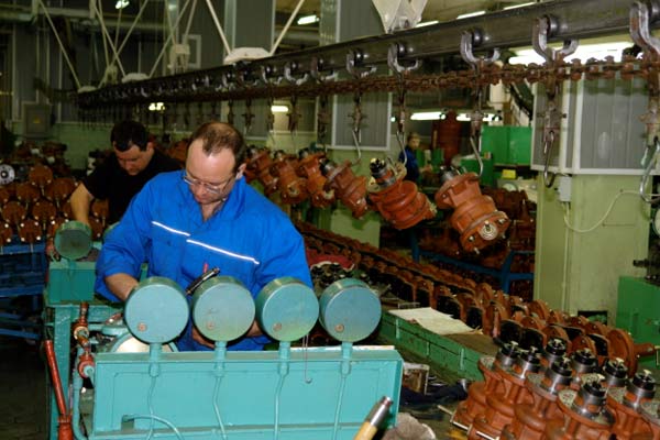 Work assembling line producing freight brake control valves
