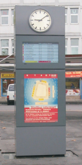 Paper backlit LCD station clock