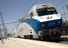 Kowloon Canton railway train in transit