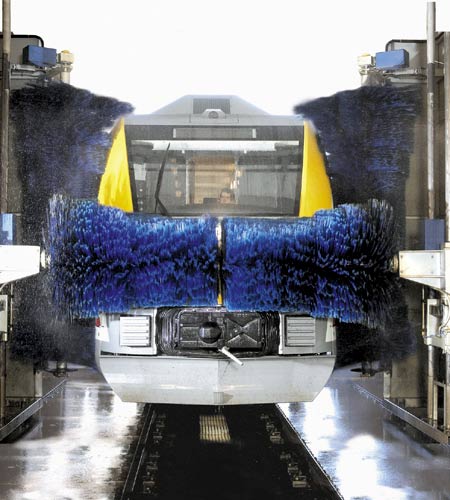 A train in the process of being washed in a Westmatic machien